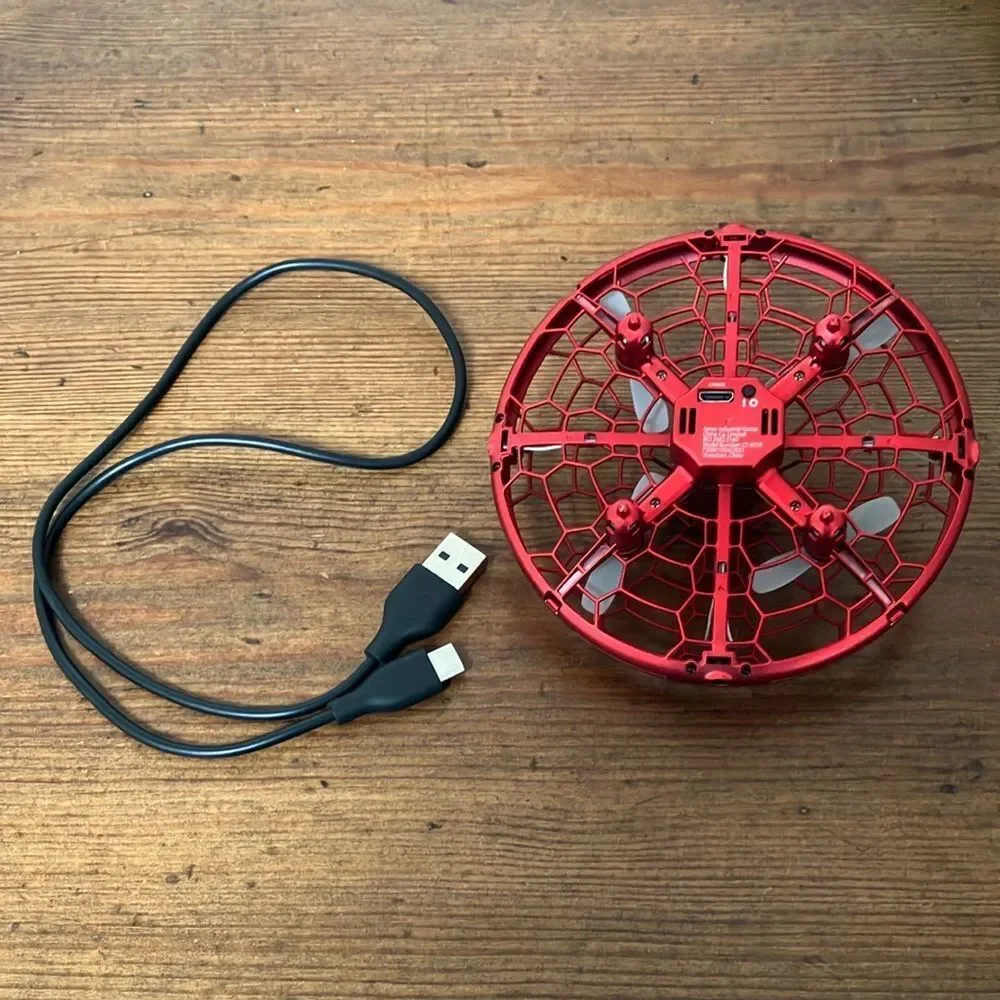 Gently Used Hand Operated Red Drone Cat Toy